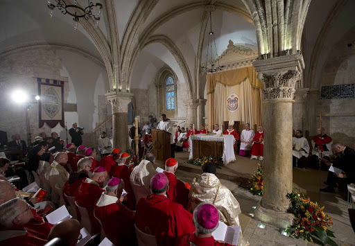JERUSALEM: Pope Francis (unseen) celebrates the Holy Mass at the site known as the Cenacle, or Upper Room, AFP PHOTO/ POOL/ ANDREW MEDICHINI