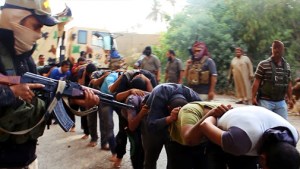Islamic State militants leading away captured Iraqi soldiers