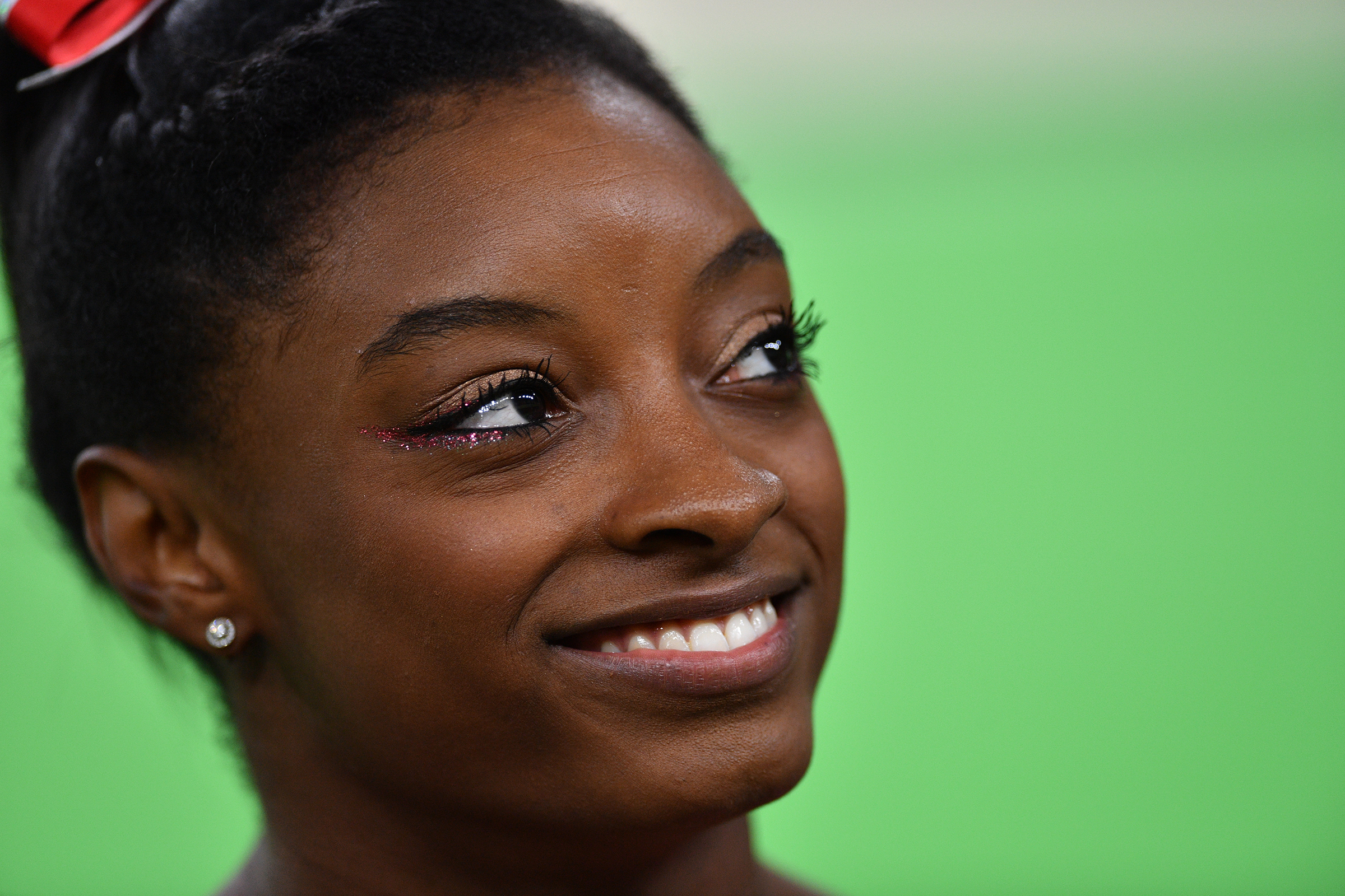 Simone Biles of the USA smiles during the Women's Vault Final at the Artistic Gymnastics events of the Rio 2016 Olympic Games at the Rio Olympic Arena in Rio de Janeiro, Brazil, 14 August 2016. Biles won the Gold medal. Photo: Lukas Schulze/dpa