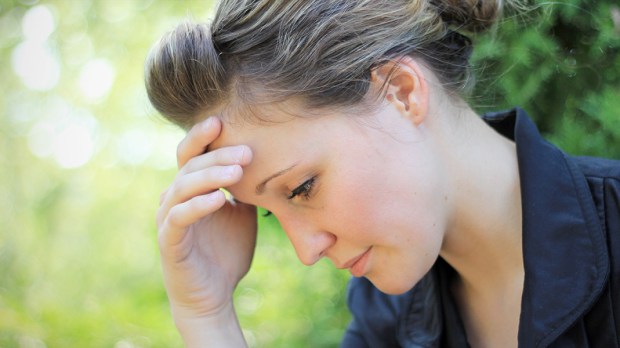 WEB3-ANXIOUS-ANXIETY-CONCERN-WOMAN-HAND-ON-FOREHEAD-Charlotte-Purdy-Shutterstock