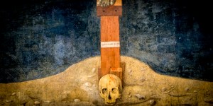 Why is there a skull beneath my crucifix?