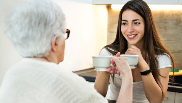 MOM AND DAUGHTER HAVE COFFEE