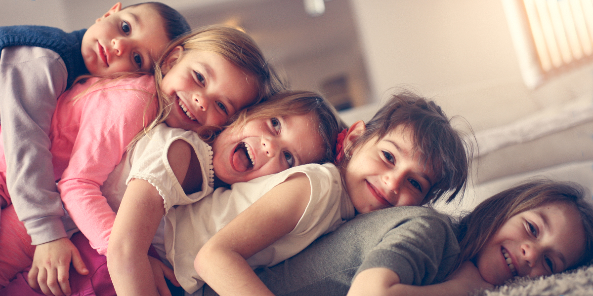 FIVE CHILDREN LAUGHING
