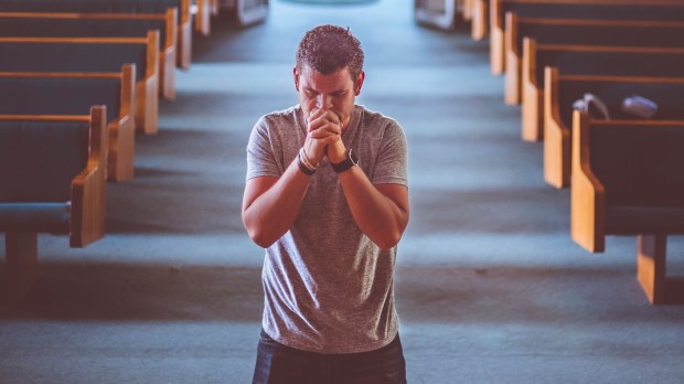 MAN,PRAYING,ALTAR