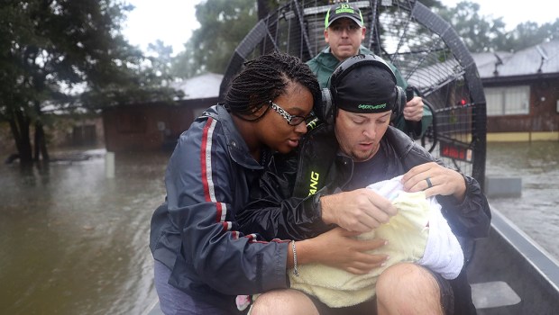 COUPLE,CHILD,HURRICANE HARVEY