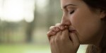 WOMAN PRAYING