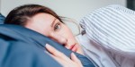 WOMAN LAYING DOWN