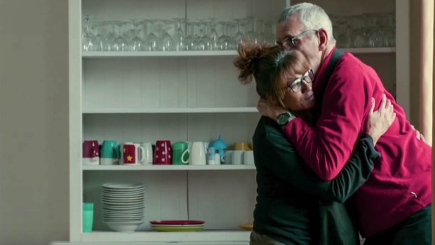 MAN AND WOMAN HUGGING