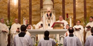 When should Catholics genuflect in a church?