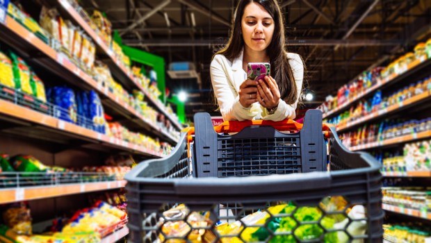 WOMAN,TEXTING,GROCERY STORE