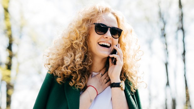 WOMAN TALKING ON PHONE