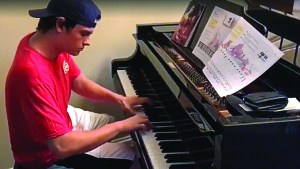 Delivery boy playing piano