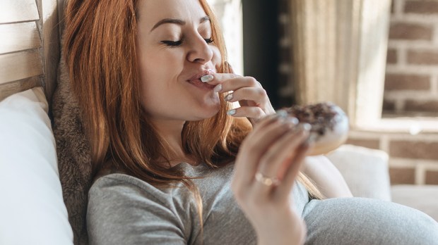 PREGNANT WOMAN EATING