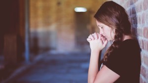 YOUNG,WOMAN,PRAYING