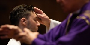 Why do priests wear violet during Lent?