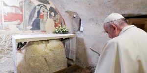 Pope Francis points to St. Francis at spot of the first Nativity scene, where Baby Jesus appeared