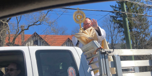 Priest takes Blessed Sacrament on ride through NY town hit by coronavirus