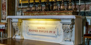 At JPII&#8217;s tomb, Polish prelate says we must start with peace at home