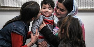 Afghan baby handed to US soldier as Kabul fell finally reunited with his family