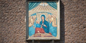 Who is Our Lady of Divine Love, linked to World War II?