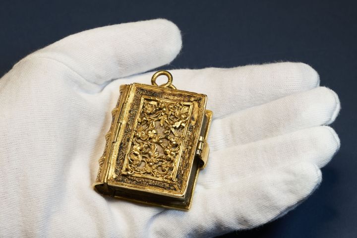 A-tiny-girdle-book-with-a-gold-binding-England-c-1540.jpg