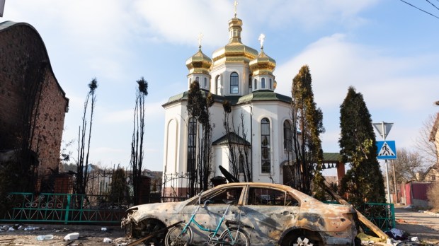 A damaged Irpin church still stands amidst the rubble of war torn Ukraine