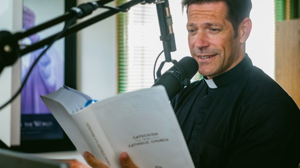 Fr. Mike reading fro Catechism