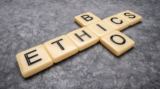 Bioethics crossword in cross shaped tile letters