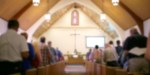 Church pews full worshipers