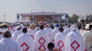 Attendees wait for Pope Francis to start the mass at the N'Dolo Airport in Kinshasa, Democratic Republic of Congo