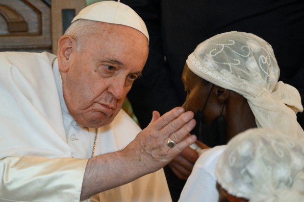 Pope Francis blessing an attendee during a meeting with victims of the conflict in eastern Democratic Republic of Congo