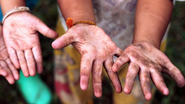 child labor dirty hands