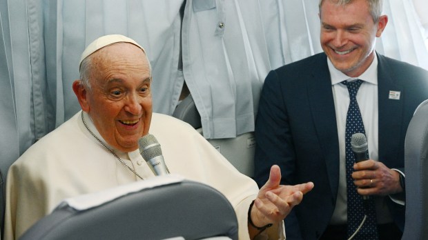Pope Francis speaks to journalists during the flight from Budapest to Italy on April 30 2023