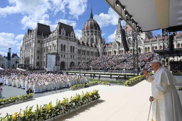 Pope-Francis-waves-as-he-celebrates-a-holy-mass-at-Kossuth-Lajos-Square-during-his-visit-in-Budapest-on-the-last-day-of-his-tree-day-trip-to-Hungary