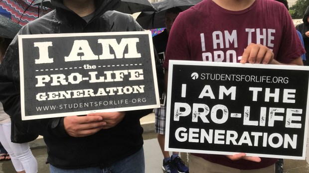 Two young men at a pro-life rally