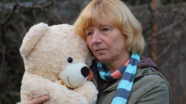 sad woman teddy bear