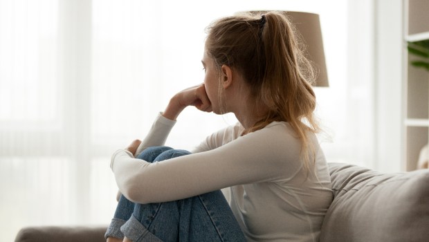 woman-side-sad-couch