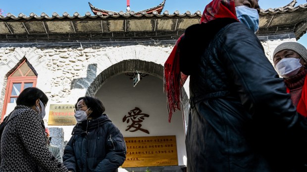 Gathering outside church in Dali, China