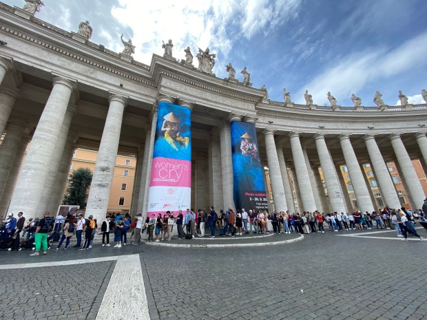 The entrance of the photo exhibit "Women's Cry" on St. Peter's Square