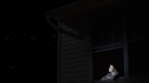 child in window stars