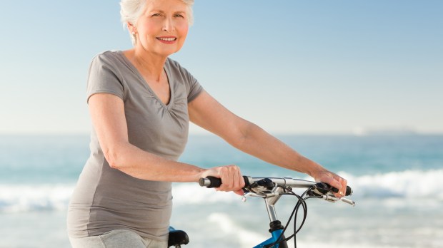 old woman bicycle