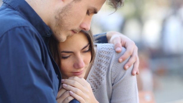 Young couple hug