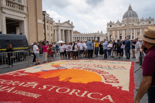 Pope Francis addresses worshippers during his Angelus prayer from the window of the Apostolic Palace