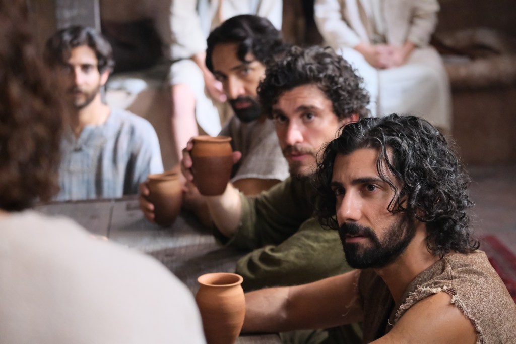 Judas, Big James, John, and Andrew listen to Jesus on The Chosen.