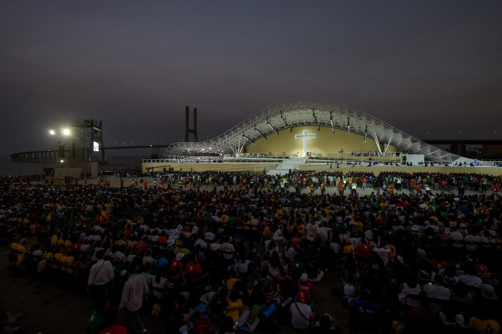 Pilgrims attend the World Youth Days vigil with young people in Tejo Park