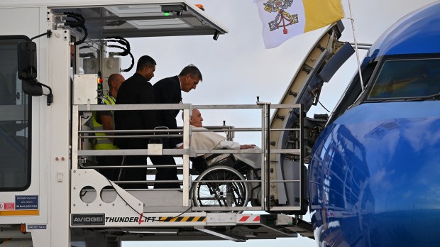 Pope-Francis-boards-his-plane-heading-to-the-World-Youth-Day-in-Lisbon-August-02-2023