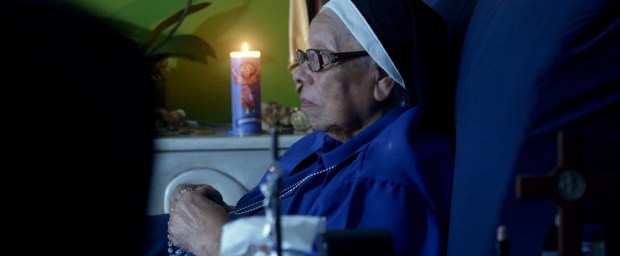 Sr. Maria Rosa Leggo watching soccer.