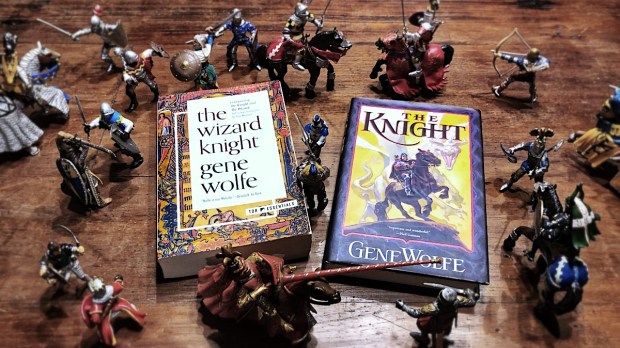 "The Knight" by Gene Wolfe on table with toy knights