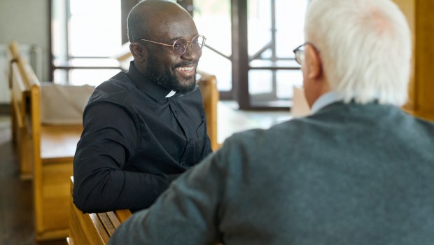 priest-man-talk-happy