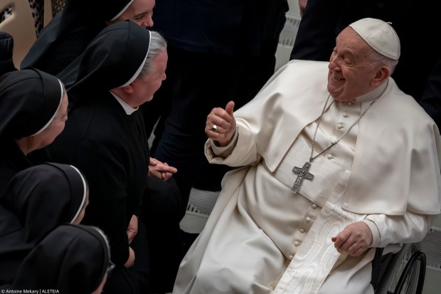 Pope Francis jokes with nuns